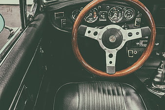 Vintage MG Car Interior with Wooden Steering Wheel