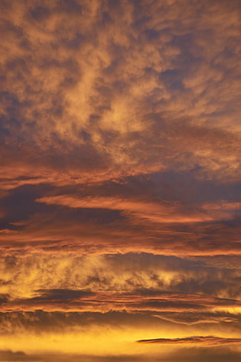 Dramatic Orange and Purple Sunset Clouds Sky