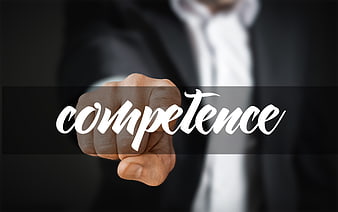 Businessman writing competence on transparent screen