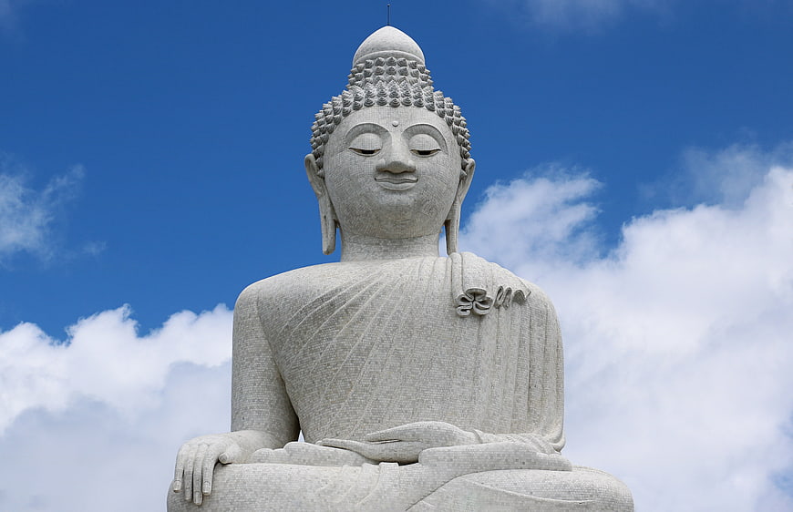 The Big Buddha of Phuket Thailand White Statue Against Blue Sky