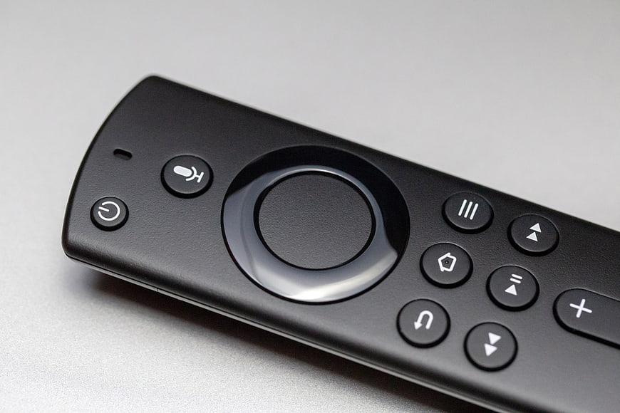 Close-up of Black Smart TV Remote Control on White Background