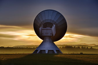 Large Radio Telescope Dish at Golden Hour Sunset