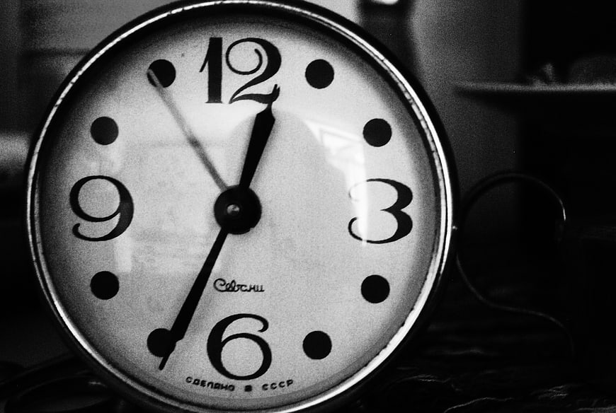Vintage Soviet Alarm Clock Close-Up in Black and White