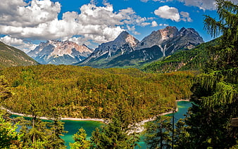 Panoramic Alpine Landscape with Turquoise Lake and Forest