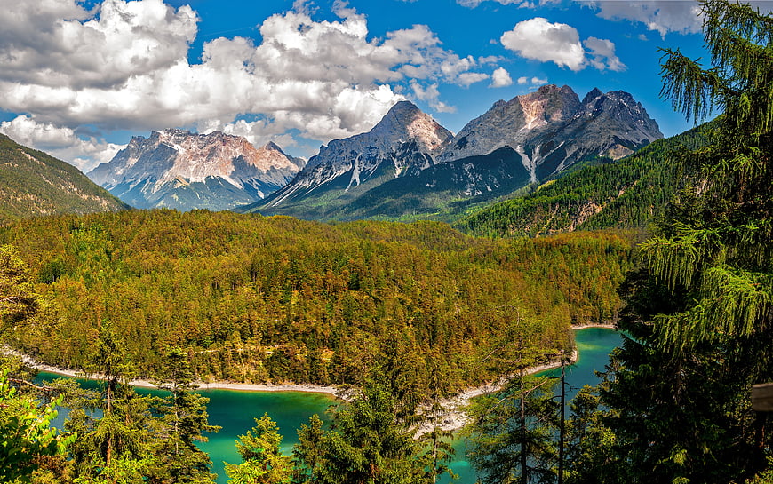 Panoramic Alpine Landscape with Turquoise Lake and Forest