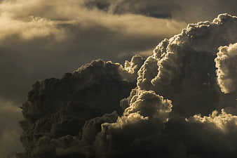 Dramatic Storm Clouds with Golden Sunlight