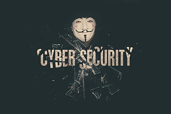 Cyber Security Concept with Guy Fawkes Mask and Broken Glass