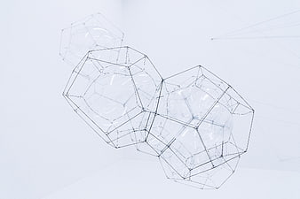 Abstract Geometric Wireframe Sculpture on White Background