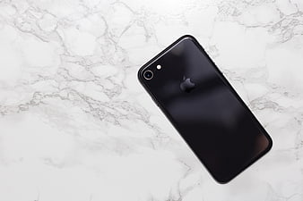 Black Smartphone Flat Lay on White Marble Background