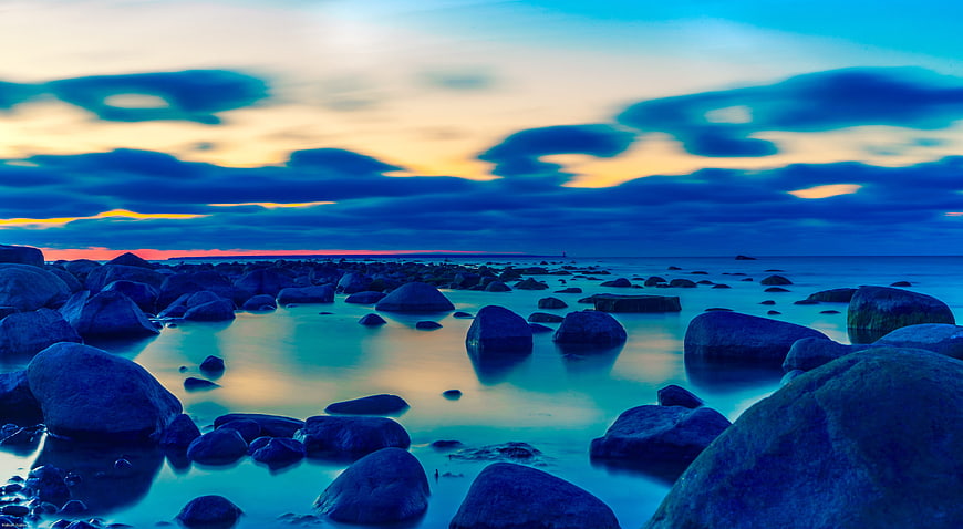 Dramatic Long Exposure Rocky Coastline at Sunset