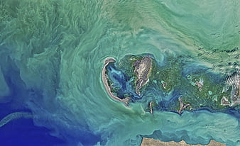 Aerial view of Caspian Sea islands and swirling water patterns