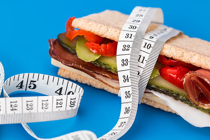 Healthy Sandwich With Tape Measure On Blue Background