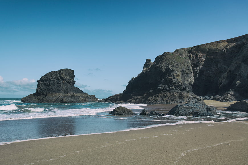 Rocky coastline with sea stack and sandy beach