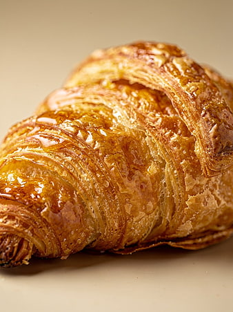 Close-up of Golden Flaky Croissant Pastry