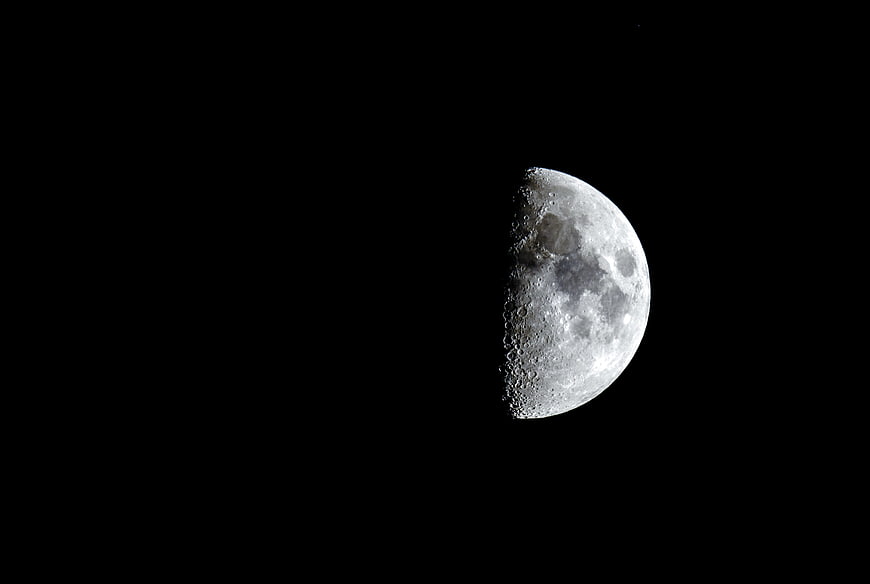 Waxing Gibbous Moon Against Black Night Sky