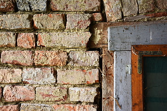 Weathered Brick Wall and Old Wooden Window Frame Texture