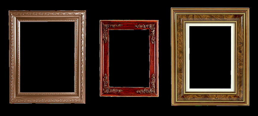 Three decorative wooden picture frames with ornate gold and red detailing