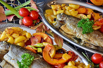 Roasted Trout with Autumn Vegetables on Silver Platters