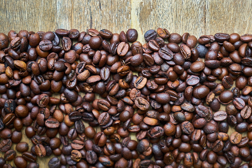 Roasted Coffee Beans on Rustic Wooden Background