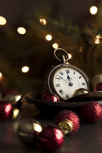 Vintage Pocket Watch with Christmas Ornaments and Bokeh Lights