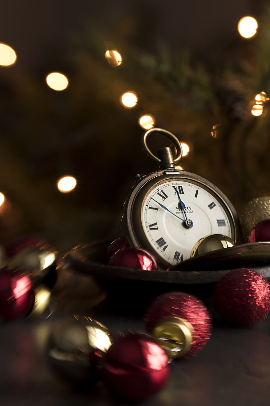 Vintage Pocket Watch with Christmas Ornaments and Bokeh Lights