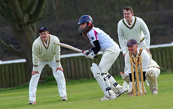Female Cricketer Batting in Women's Cricket Match