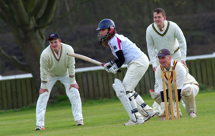 Female Cricketer Batting in Women's Cricket Match