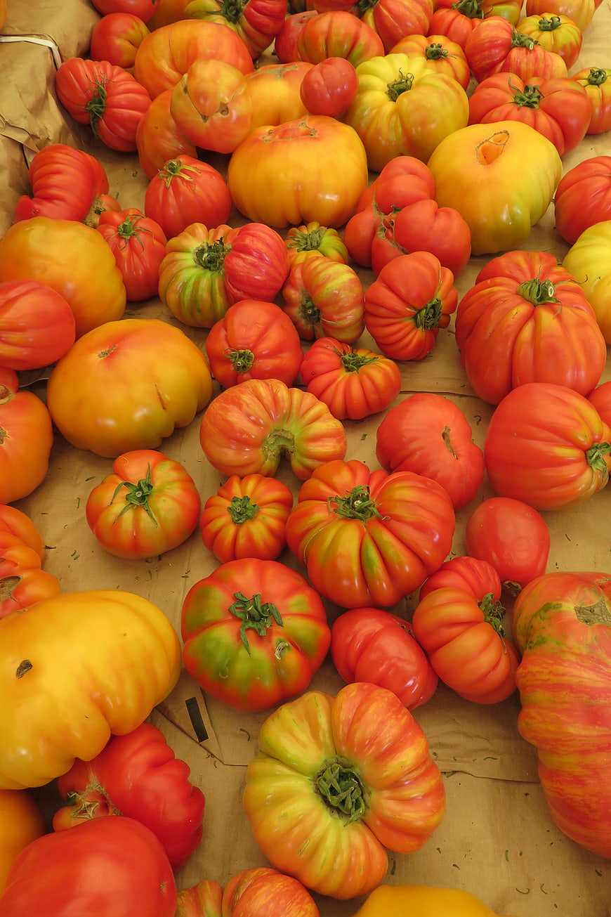 Colorful Heirloom Tomatoes on Brown Paper