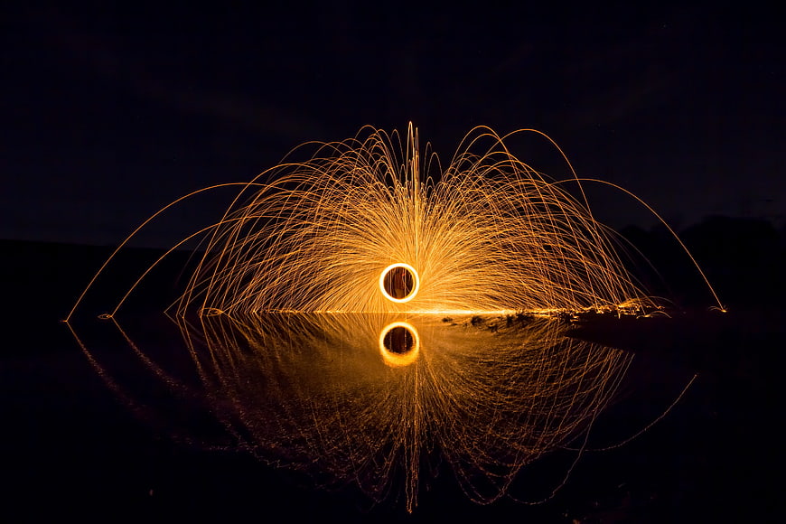Steel Wool Light Painting with Reflection in Water at Night