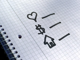 Handwritten heart, dollar, and house checklist on grid paper
