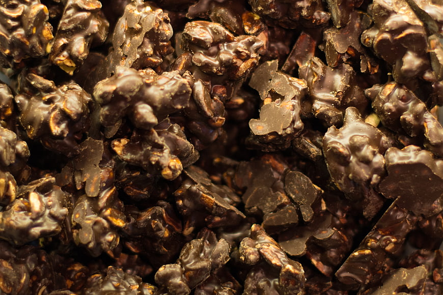 Close-up of crunchy dark chocolate clusters with nuts