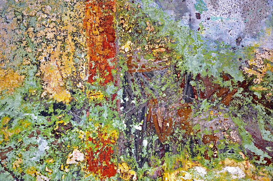 Abstract textured painting with vibrant green, orange, and blue brushstrokes