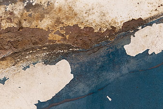 Abstract Rusty Metal Texture with Peeling Blue and White Paint
