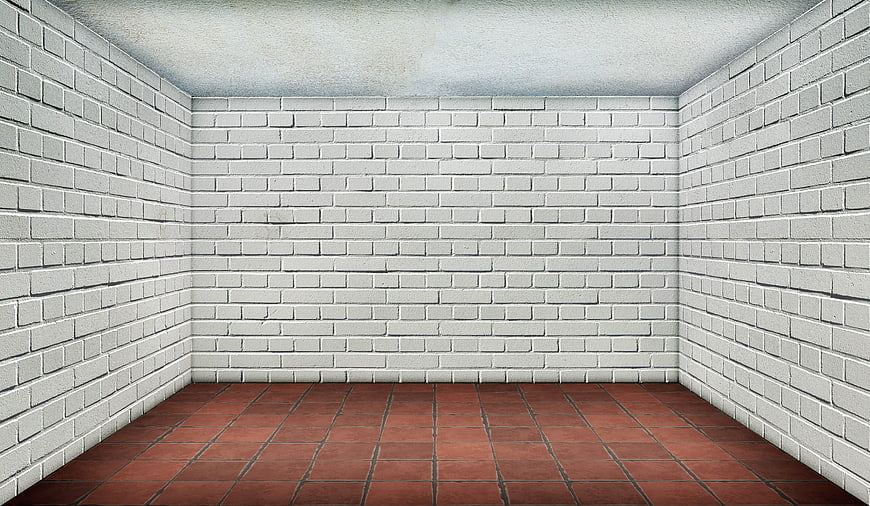 Empty Room with White Brick Walls and Red Tile Floor