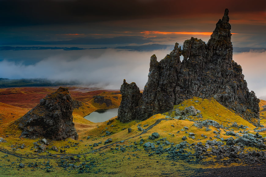 Dramatic Old Man of Storr rock formation at sunrise