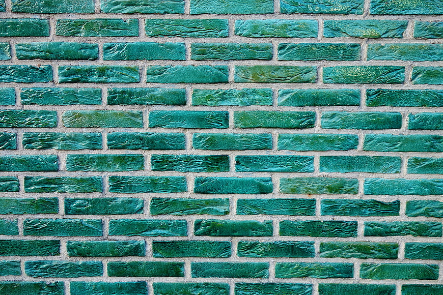 Textured Green Glazed Brick Wall Background