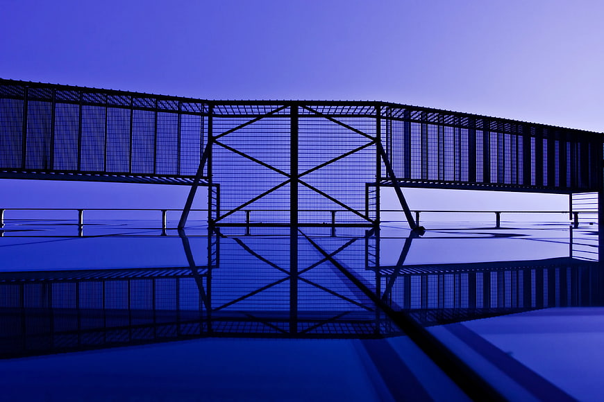 Abstract Blue Metal Cage Structure with Reflection