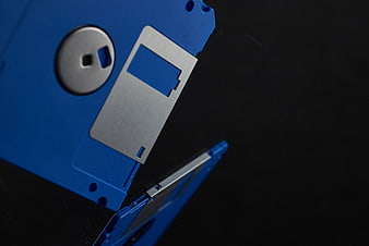 Blue Floppy Disk on Black Background