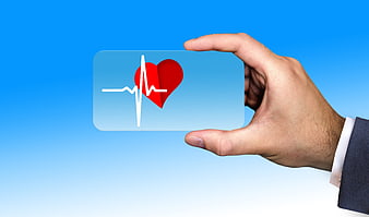Hand holding digital card with heart icon and pulse line