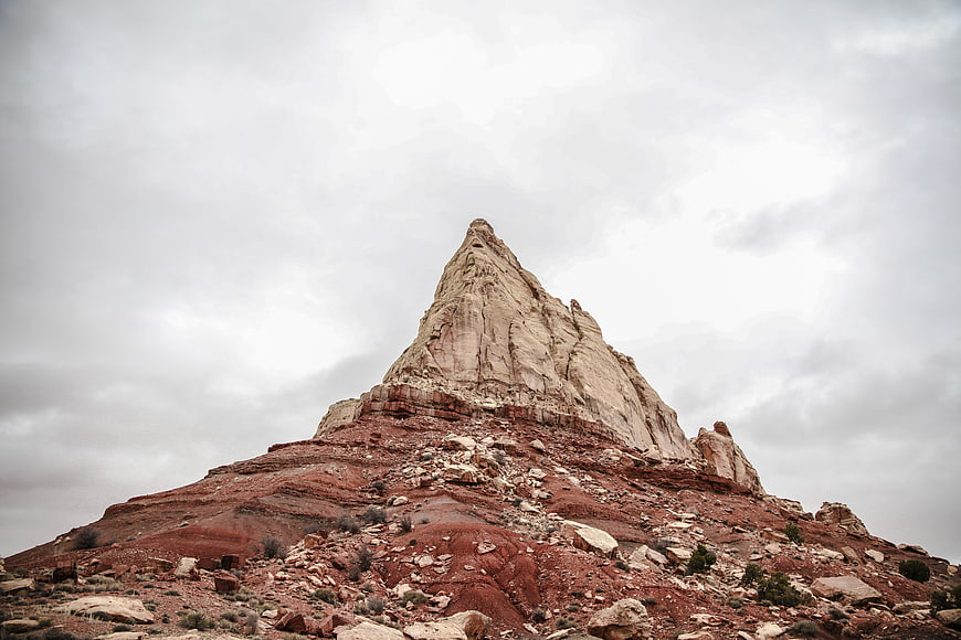 Dramatic Red Rock Butte Against Overcast Sky