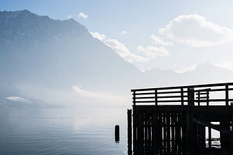 Serene Wooden Dock on Misty Mountain Lake