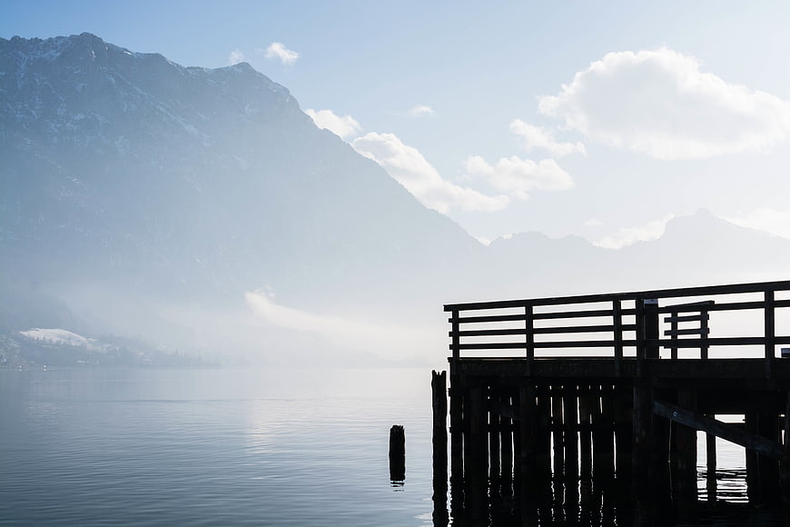 Serene Wooden Dock on Misty Mountain Lake