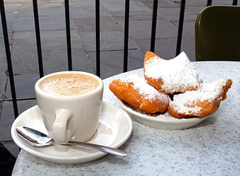 Café au Lait and Beignets on Outdoor Café Table