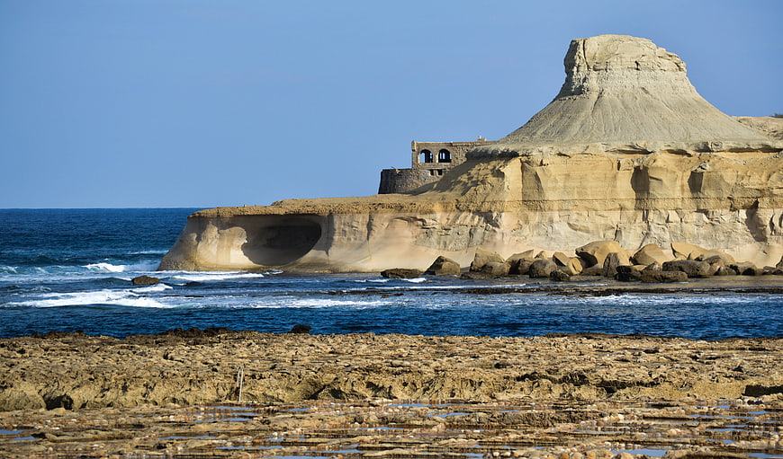 Coastal Landscape with Rock Formation and Ruins