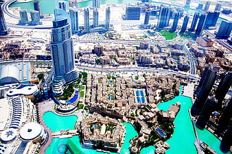 Aerial View of Dubai Cityscape with Skyscrapers and Waterways