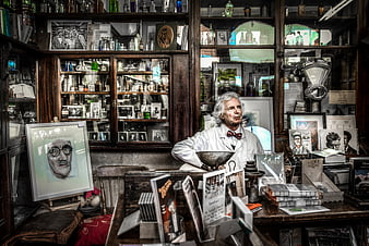 Old-fashioned chemist shop interior with man in white coat