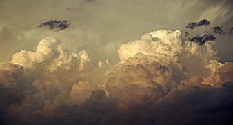 Dramatic Golden Hour Storm Clouds with Dark Shadows