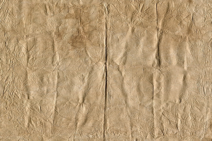 Crumpled brown paper texture background