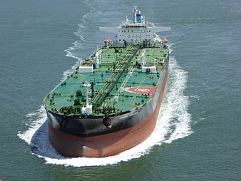 Aerial view of large oil tanker ship sailing on ocean