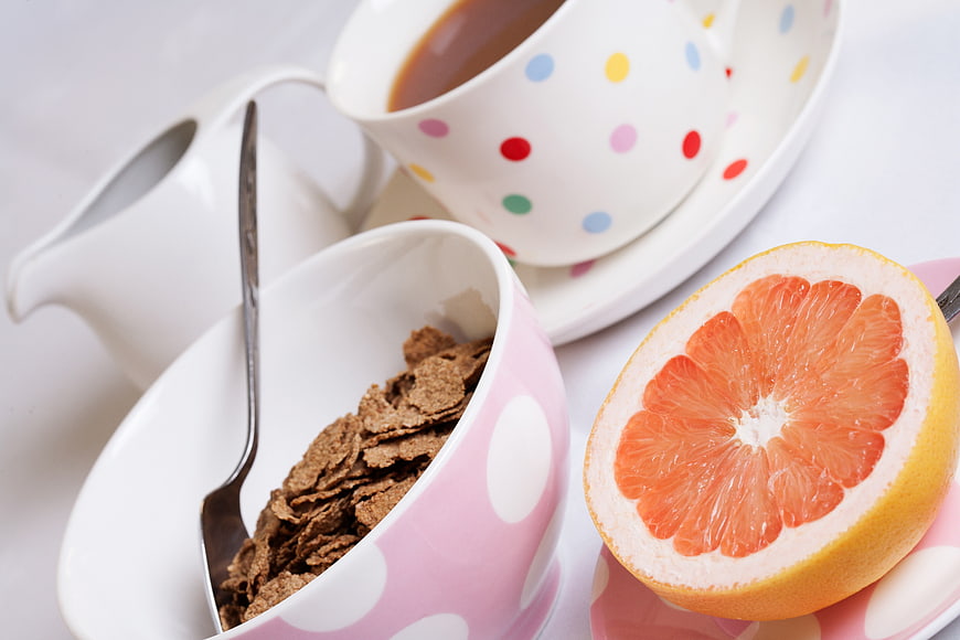 Healthy Breakfast with Cereal, Grapefruit, and Tea